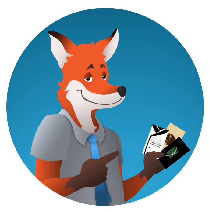 slyfox mascot holding several custom business cards - SlyFox Web Design and Marketing