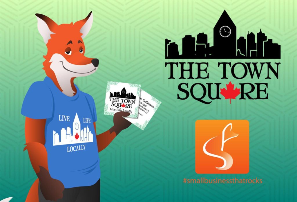 Slyfox Mascot holding The Town Square business cards - SlyFox Web Design and Marketing