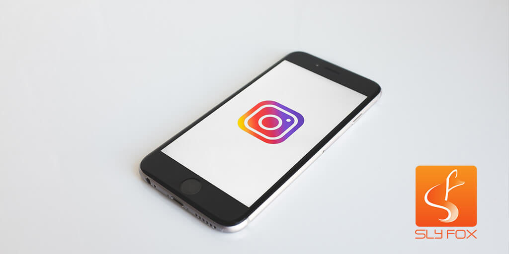 instagram logo on iphone image feature slyfox blog - SlyFox Web Design and Marketing
