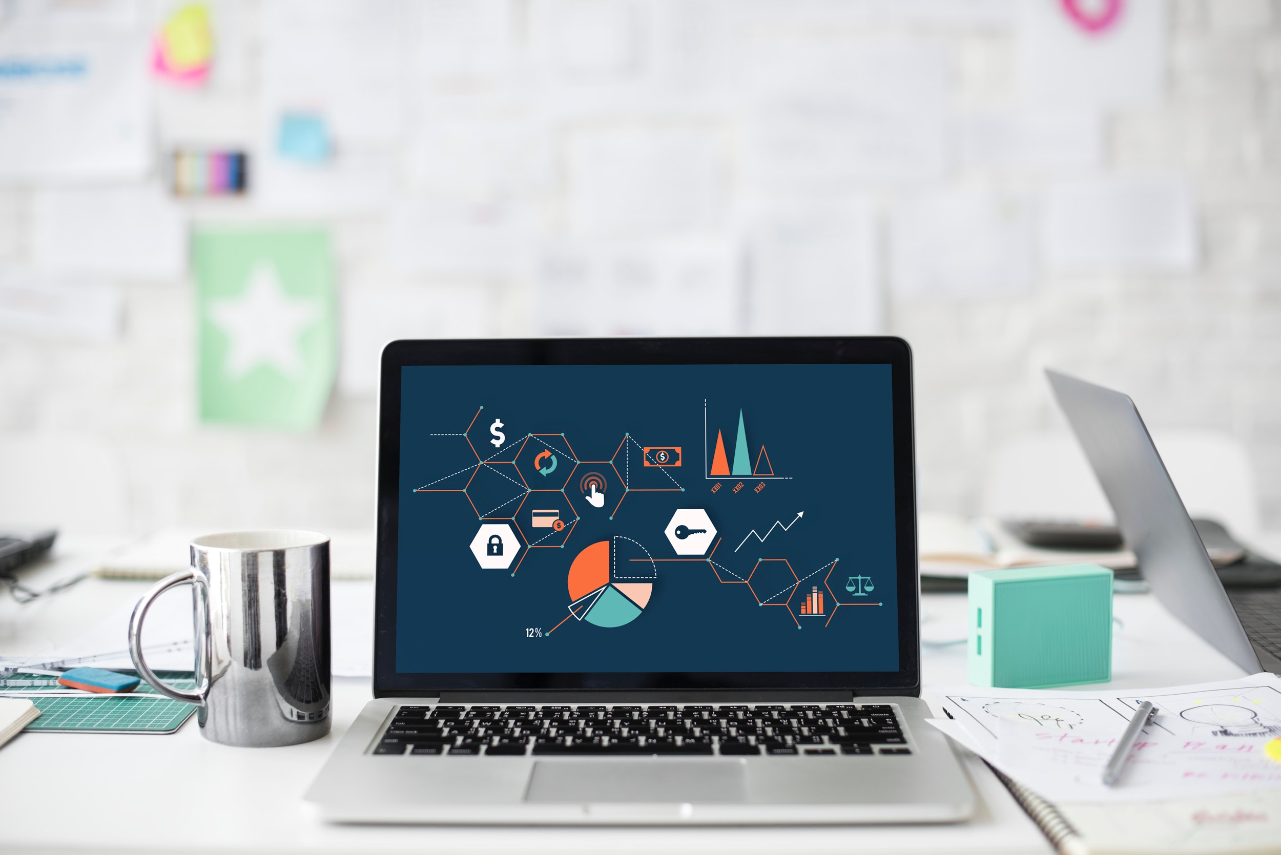 Recourse Site Image | SlyFox Digital Media Marketing graphs and marketing images on macbook screen - SlyFox Web Design and Marketing