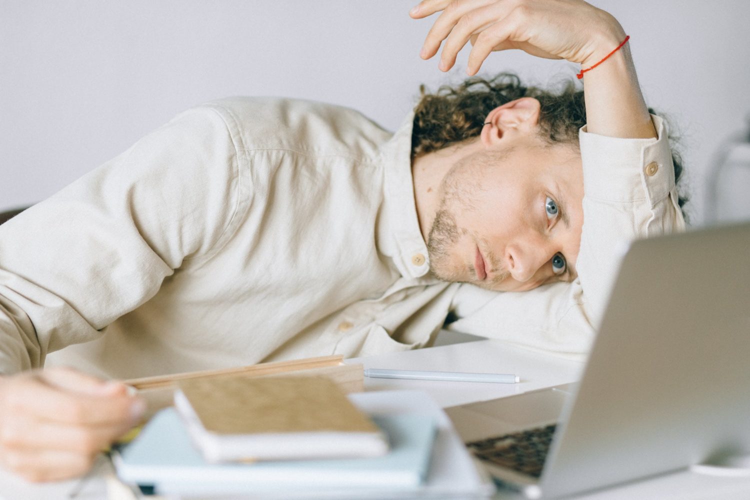 Man stressed out on laptop